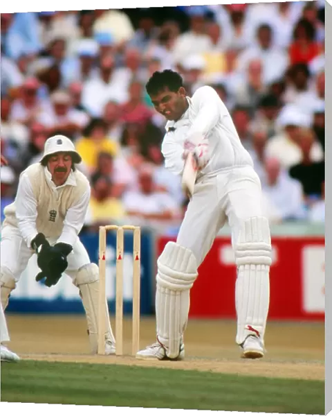 Indias Mohammad Azharuddin on the way to scoring 179 against England in the 2nd Test at Old Trafford in 1990