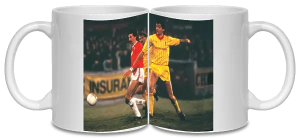 Alan Hansen and Kevin Summerfield suring the 1984 League Cup semi-final
