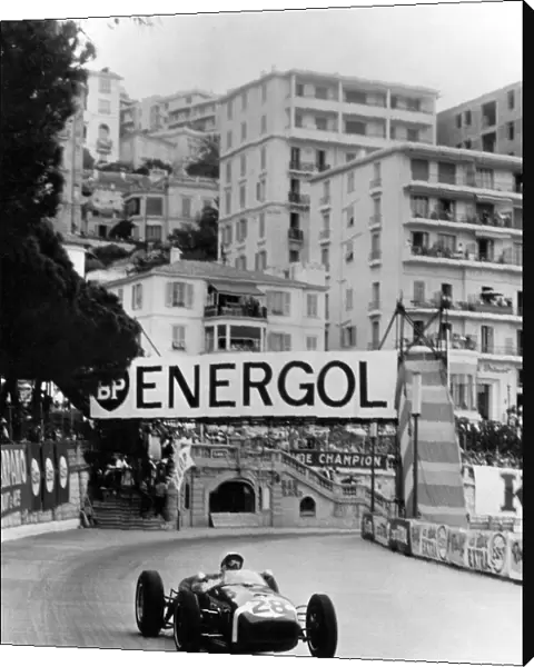 Stirling Moss on the way to winning the 1960 Monaco Grand Prix in his Lotus Climax +