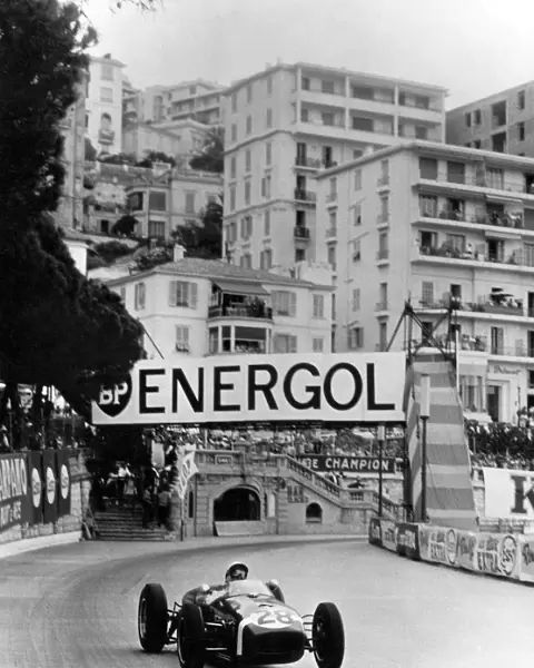 Stirling Moss on the way to winning the 1960 Monaco Grand Prix in his Lotus Climax +