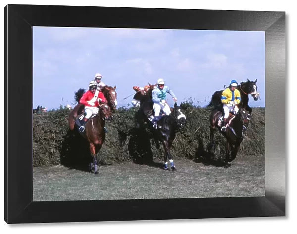 Rubstic, centre, on the way to winning the Grand National