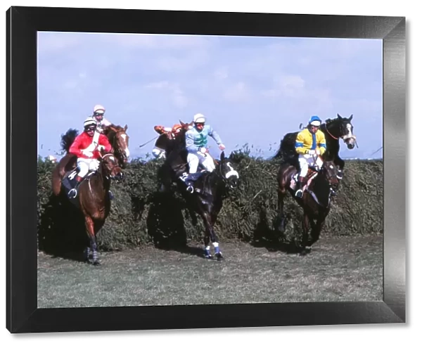 Rubstic, centre, on the way to winning the Grand National