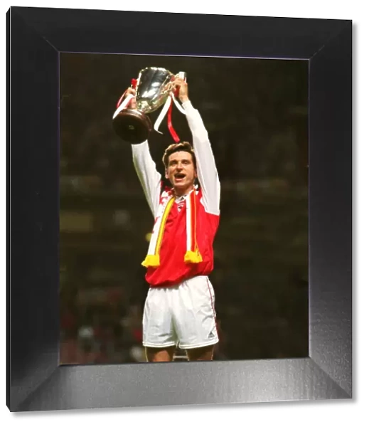 Arsenal goalscorer Alan Smith lifts the 1994 European Cup Winners Cup
