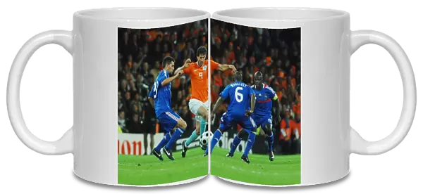 Ruud Van Nistelrooy takes on France during Euro 2008