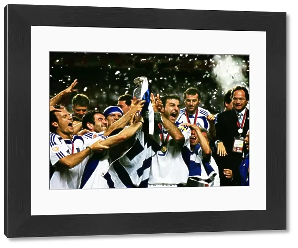 Traianos Dellas and the Greece team celebrate winning Euro 2004 Final