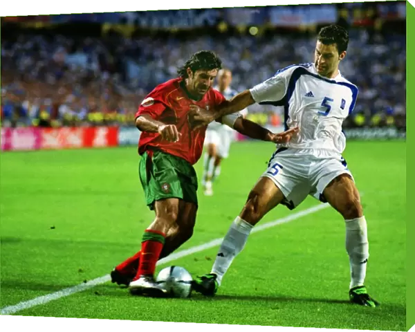 Luis Figo and Traianos Dellas during the Euro 2004 Final
