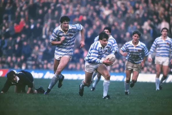 Rob Andrew makes a break during the 1984 Varsity Match