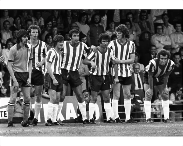 Southampton players form a wall in the 1974  /  5 season