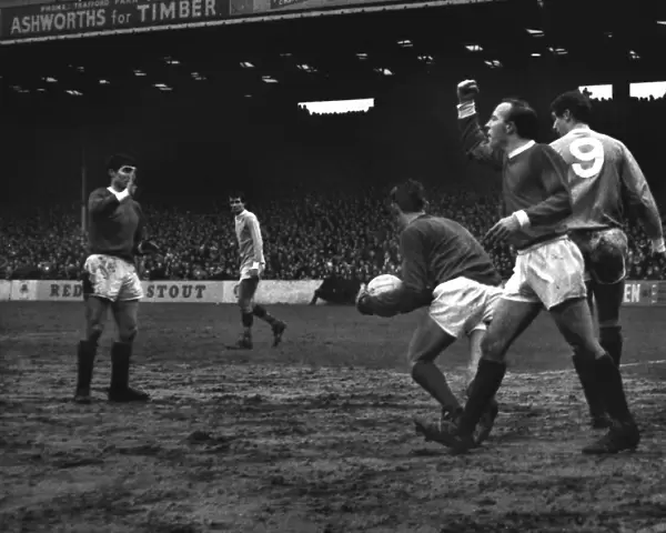 Nobby Stiles shakes a fist during the 1966  /  7 Manchester derby at Maine Road