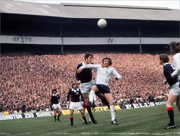 Englands Colin Bell and Scotlands Bobby Moncur jump for the ball durin the 1972 Home Championship