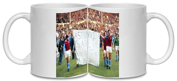 Aston Villa players parade a banner at Wembley after the 1977 League Cup Final