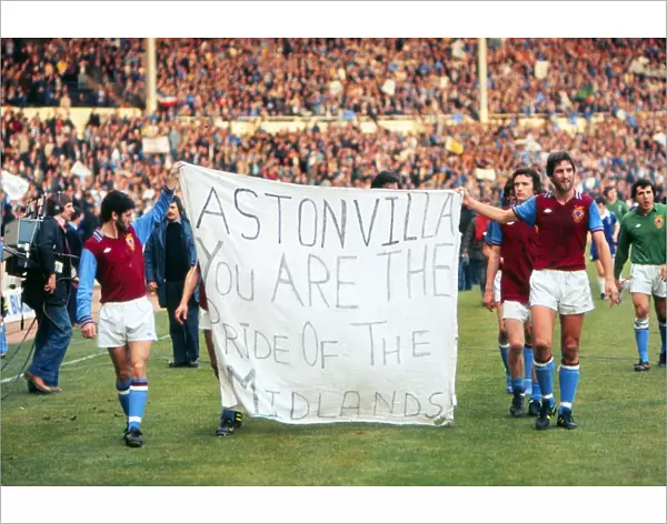 Aston Villa players parade a banner at Wembley after the 1977 League Cup Final