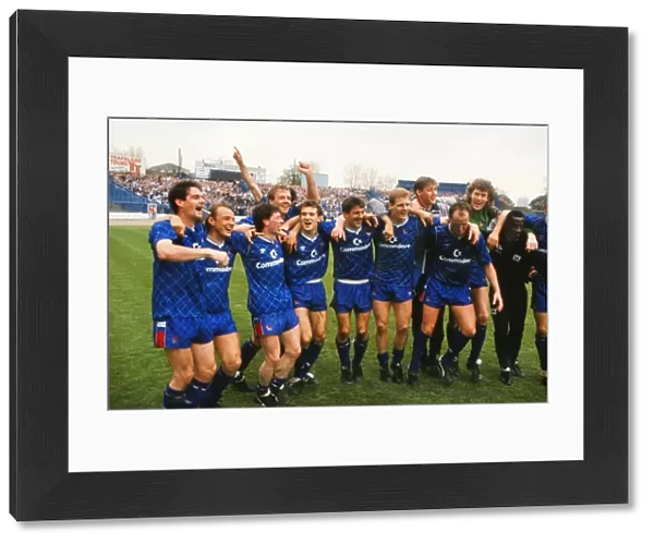 Chelsea players celebrate promotion to the First Division in 1989