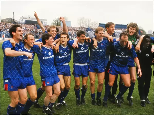 Chelsea players celebrate promotion to the First Division in 1989
