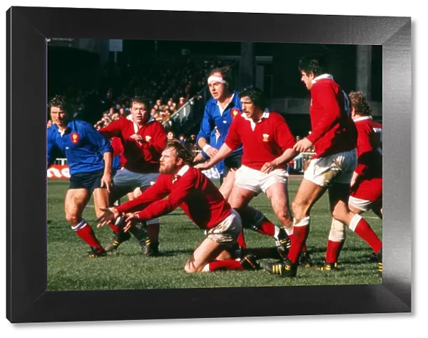 Wales Derek Quinnell passes the ball out against France - 1978 Five Nations