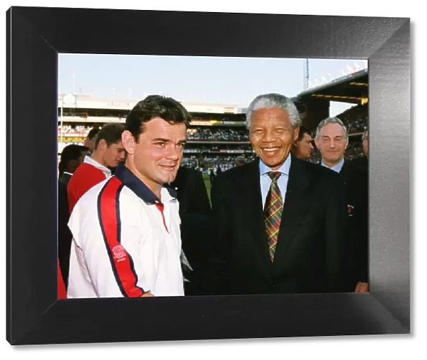 England captain Will Carling meets Nelson Mandela before the First Test against South Africa in 1994