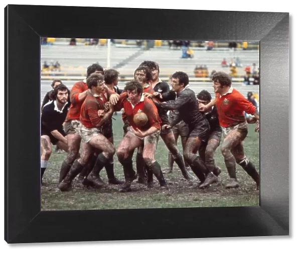 The British Lions and Junior All Blacks clash in the mud in 1977