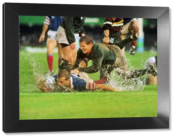 Frances Fabien Galthie and South Africas James Small - 1995 Rugby World Cup