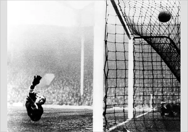 Italy goalkeeper Carlo Ceresoli is beaten by an English shot at Highbury in 1934 +