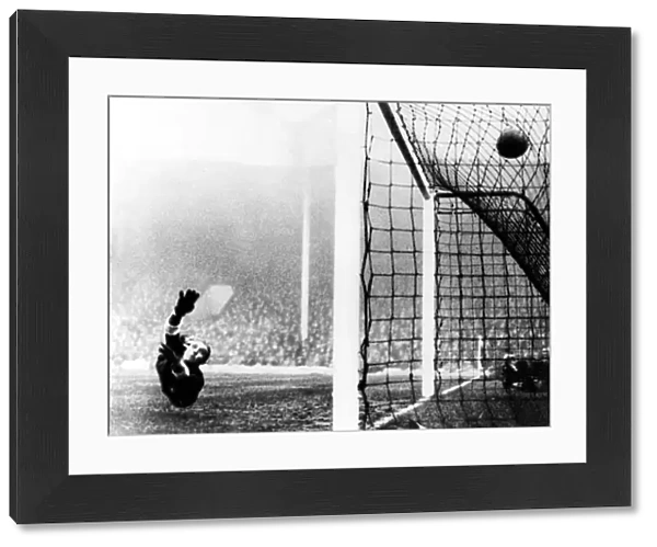 Italy goalkeeper Carlo Ceresoli is beaten by an English shot at Highbury in 1934 +