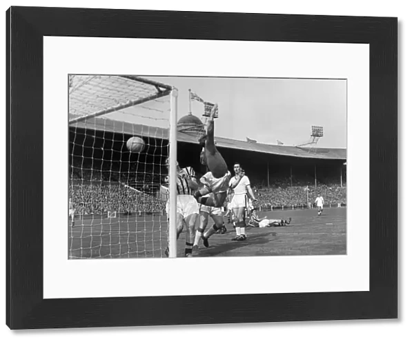 Manchester Uniteds Tommy Taylor scores in the 1957 FA Cup Final