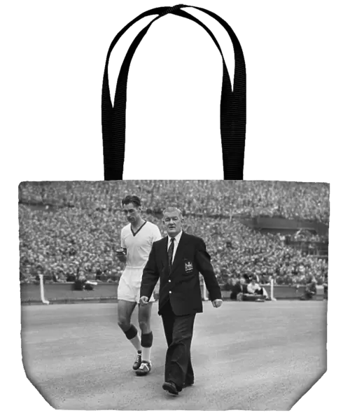 Ray Wood leaves the field injured in the 1957 FA Cup Final