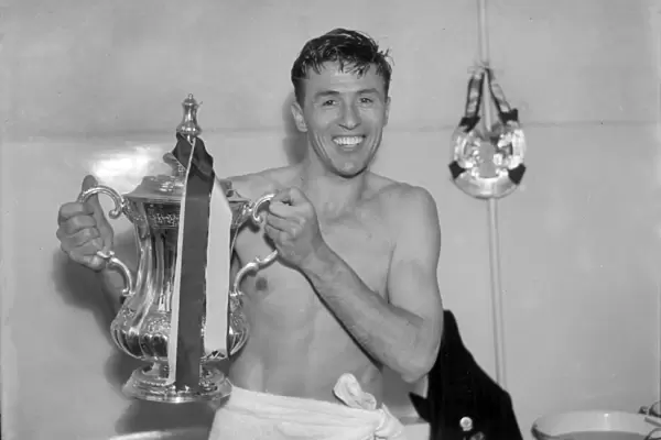 Aston Villa captain Johnny Dixon with the FA Cup in 1957