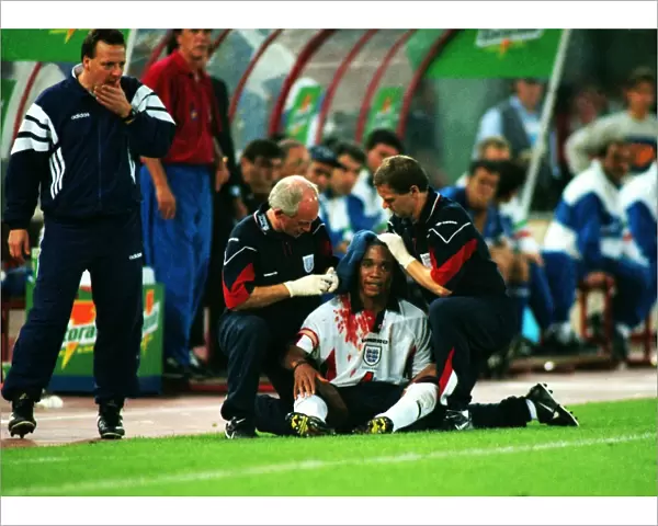 A bloodied Paul Ince during Englands famous draw with Italy in Rome in 1998