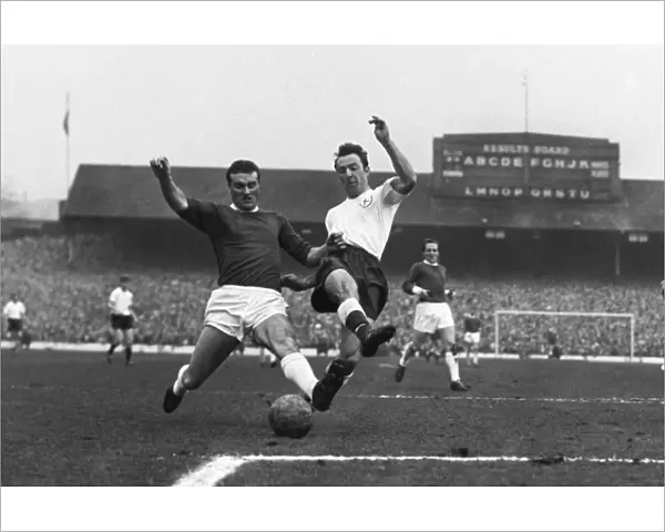 Jimmy Greaves and Noel Cantwell compete for the ball in the 1962 FA Cup semi-final