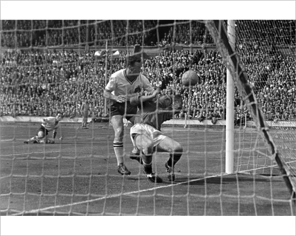 Nat Lofthouse controversially collides with goalkeeper Harry Gregg for his second goal in the 1958 FA Cup Final
