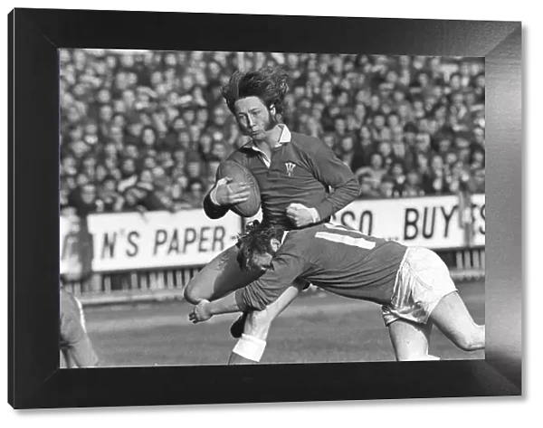 Wales JPR Williams is tackled by Irelands Barry McGann - 1973 Five Nations
