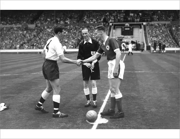 Danny Blanchflower and Jimmy Walsh shake hands before the 1961 FA Cup Final