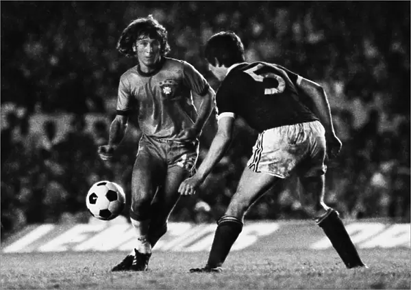 Brazils Zico runs at Scotlands Tom Forsyth in 1977