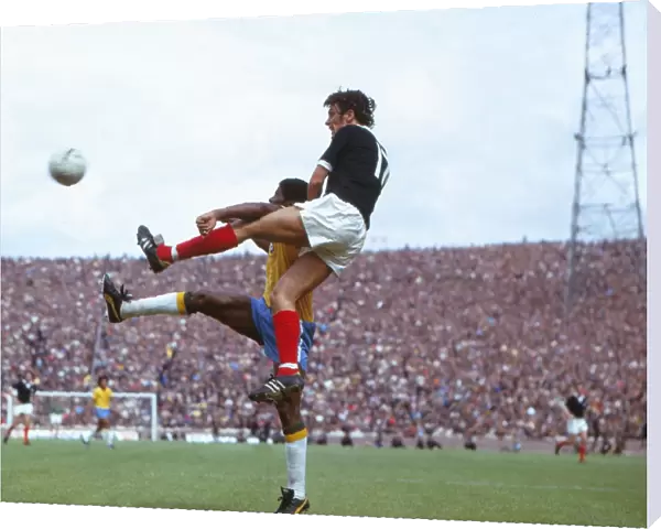 Scotlands Joe Jordan wins a header against Brazil in 1973