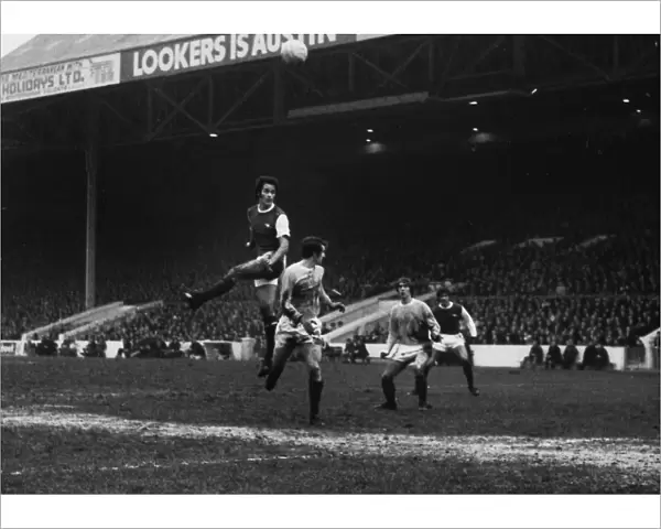 Arsenals George Graham out-jumps Citys Mike Doyle during the 1970  /  1 season
