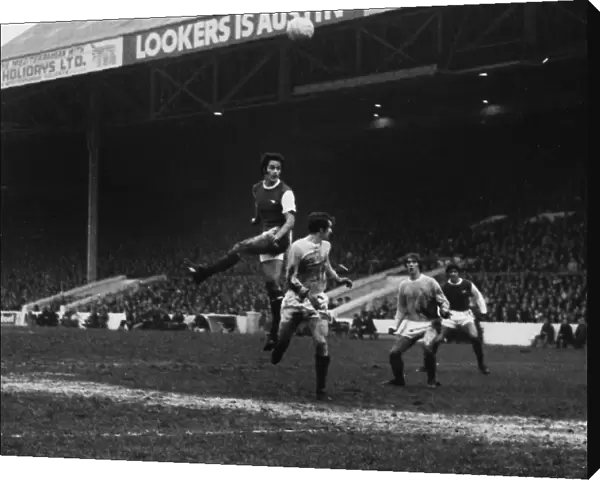 Arsenals George Graham out-jumps Citys Mike Doyle during the 1970  /  1 season