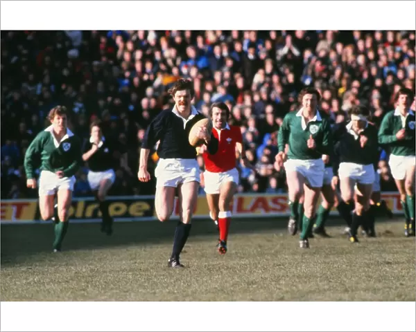 Scotlands Alan Lawson makes a break against Ireland - 1979 Five Nations