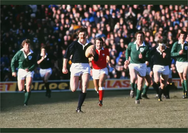 Scotlands Alan Lawson makes a break against Ireland - 1979 Five Nations