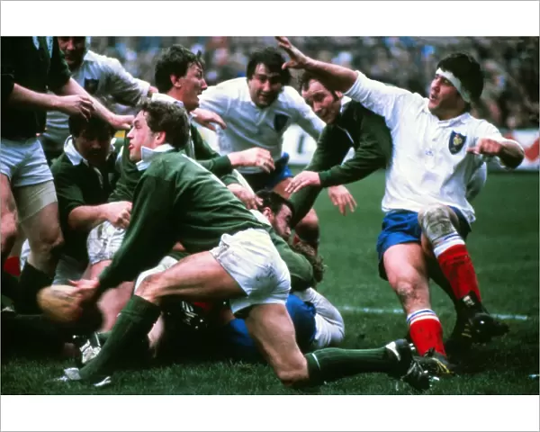 Irelands John Robbie gets the ball away against France - 1981 Five Nations