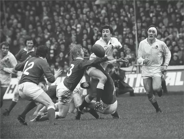 Englands Martin Cooper is tackled against Wales - 1975 Five Nations