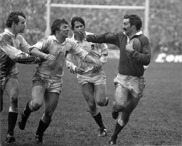 Wales Leslie Keen fends off English defenders - 1980 Five Nations