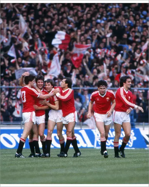 Bryan Robson celebrates the first goal of the game with his Manchester United teammates - 1983 FA Cup Final replay