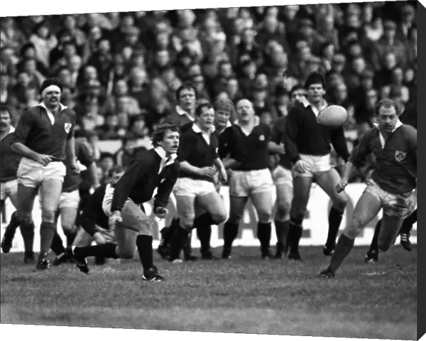 Scotlands John Rutherford gets the ball away - 1985 Five Nations