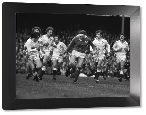 Irelands Willie John McBride kicks ahead against England - 1974 Five Nations