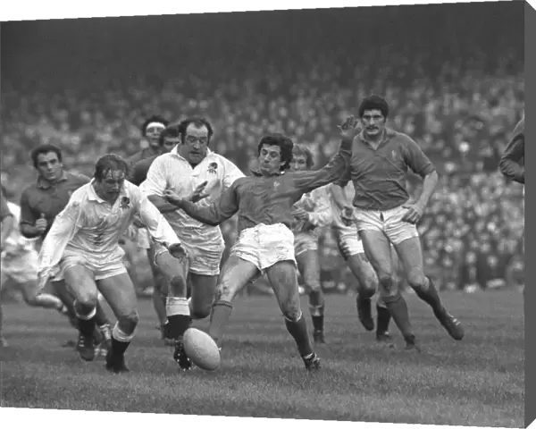Frances Richard Astre and Englands Peter Wheeler compete for the ball - 1975 Five Nations