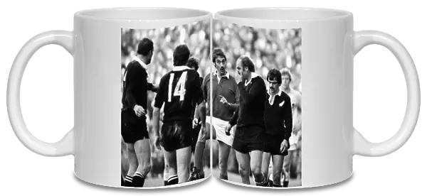 Referee Norman Sanson has a word with All Black John Spiers at Twickenham in 1979