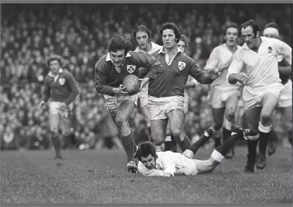 Irelands John Moloney makes a break during the 1974 Five Nations