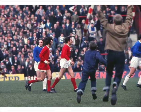 George Best and Shay Brennan run off the Old Trafford pitch after the last game of the 1968  /  9 season