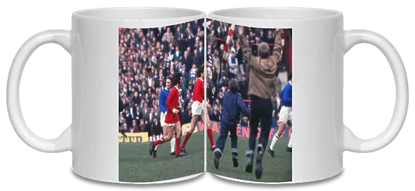 George Best and Shay Brennan run off the Old Trafford pitch after the last game of the 1968  /  9 season