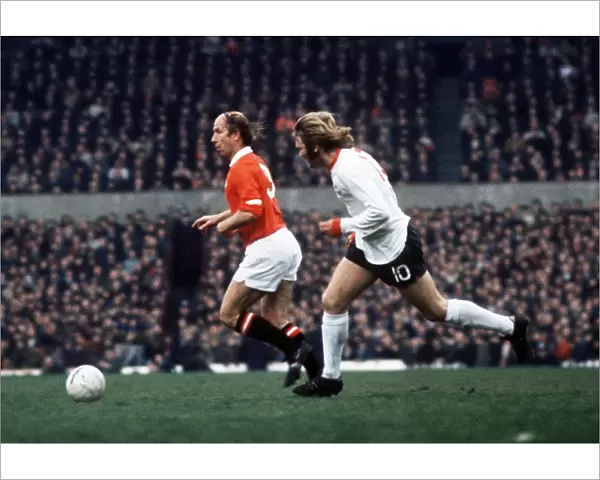 Bobby Charlton on the ball during his last home game for Manchester United